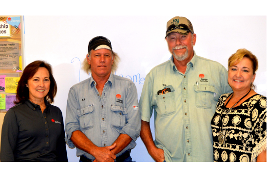 During Entergy Texas President & CEO Sallie T. Rainer's visit to the Silsbee office, she visited with employees who were acknowledged by customers for a job well done. Employees pictured to the right of Rainer: Tommy Jasper, TC Evans and Melinda Belt.